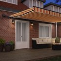 VidaXL Ręczna markiza chowana z LED, żółta i pomarańczowa 500x350 cm